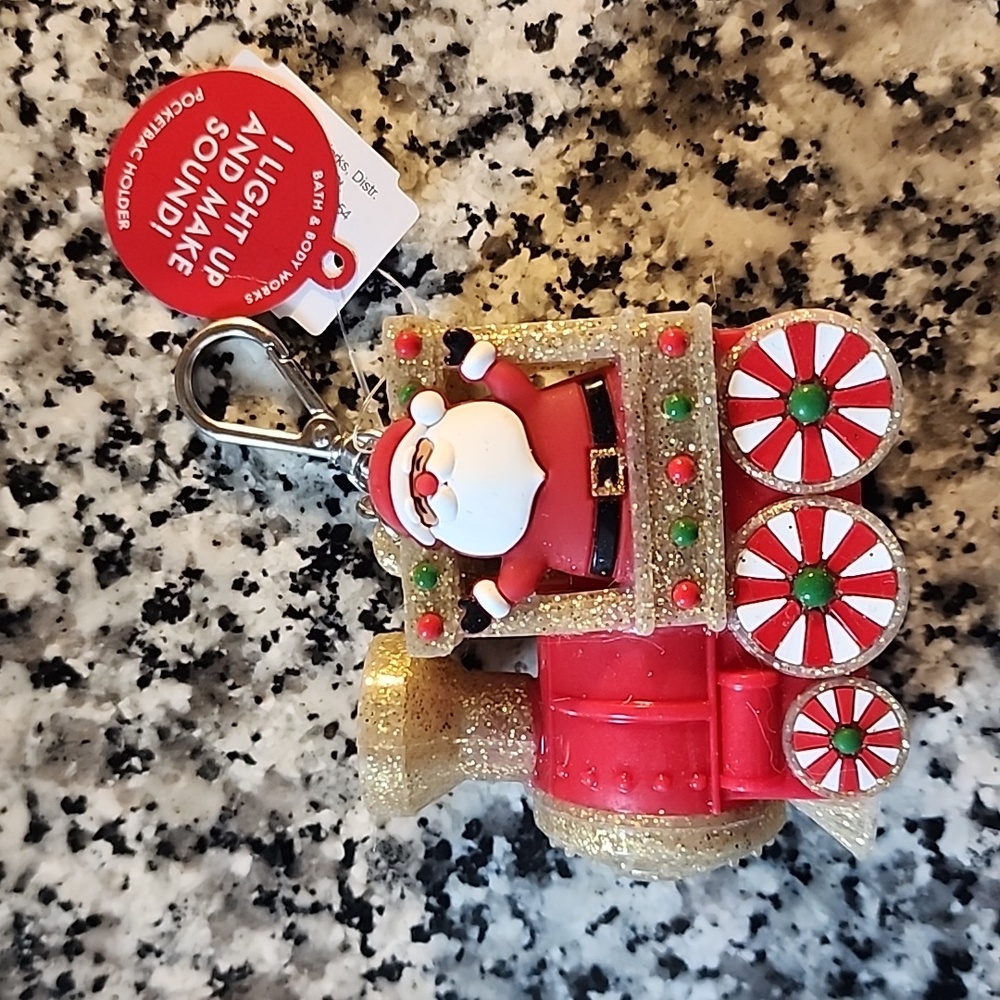2023 BBW Christmas Santa and train light up & music playing pocketbac holder.